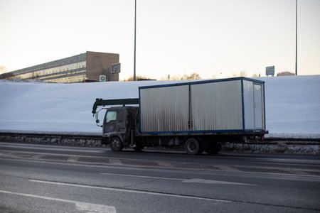 Truck carries container. transport on road. car on highway.の写真素材