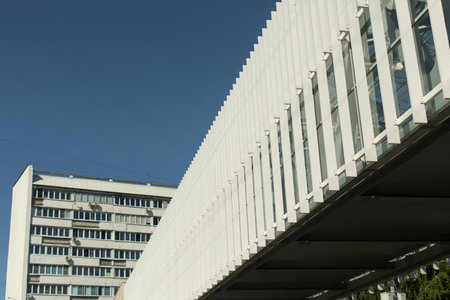 Bridge is made of steel beams. Details of architecture of pedestrian bridge. Modern design of steel construction.の写真素材