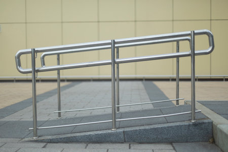 Steel handrail for few mobile people. architecture details. Lift for stroller. Comfortable urban environment.の写真素材
