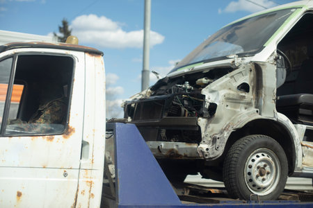 Wrecked car on bannerman. Transportation of car. car after accident. original cargo.の写真素材
