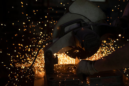 Sparks from welding. metal cutting. production details. industrial background.の写真素材