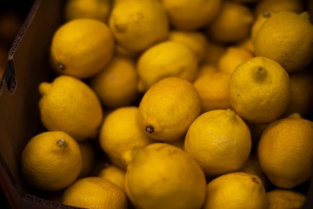 Lemon in drawer. Lots of lemons on market. Vitamin C fruit. Health food.の写真素材