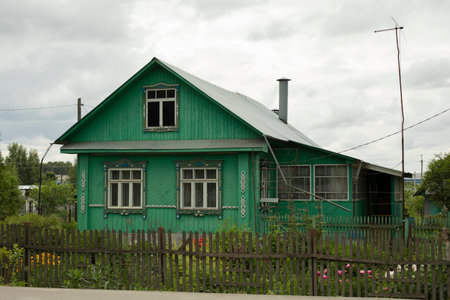 green village house. house in the countryside. Wooden cottage in Russia. old architecture.の写真素材