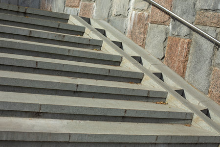 Steps in city. Stairs in the park. Concrete stairs. Ramp for lifting stroller.の写真素材