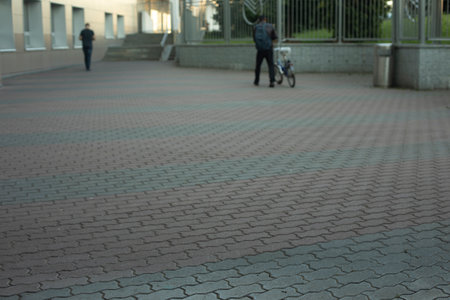area in city. Tile on road. Tile coating of area. Street details on summer day.の写真素材