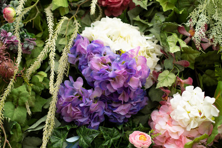 Dry flowers. wall of roses. Texture floral decoration. Bright bouquet. plant wall details.の写真素材