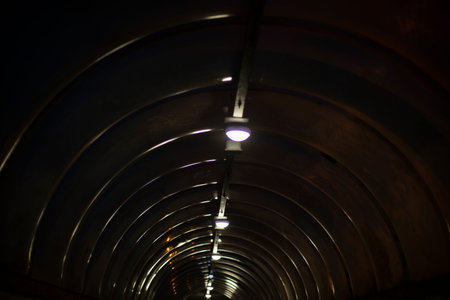 Tunnel at night. Details of architecture in dark. urban transport infrastructure.