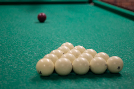 game of billiards. White balls for cue strike. sports competition. Details of interior of rest room.の写真素材