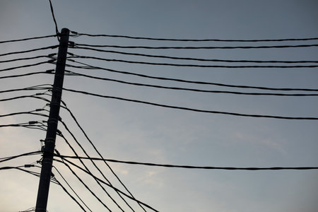 wires against the sky. Lots of electrical wires. Electric transmission lines.の写真素材