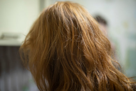 red hair. Dyed girl's hair. long hairstyle.の写真素材