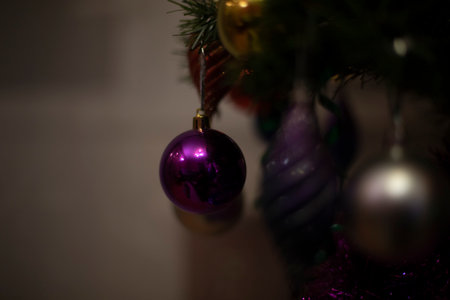 Christmas decorations. Embellishment for the New Year. Toys on the branches. Glass balls on wood.の写真素材