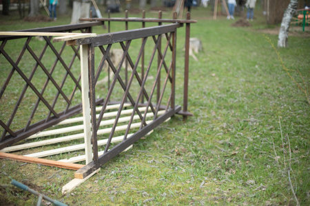 wooden construction. Structure lies on grass. wooden beams. Creation of park.の写真素材