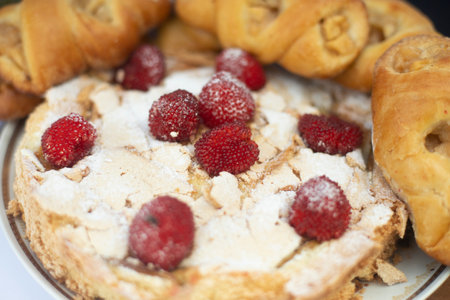 Pie with berries. Apple pie with strawberries. Sweet food. Flower pastries.の写真素材