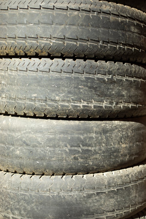 Old Car Wheels. Rubber Tires. Wheels in a landfill. Old tires.の写真素材