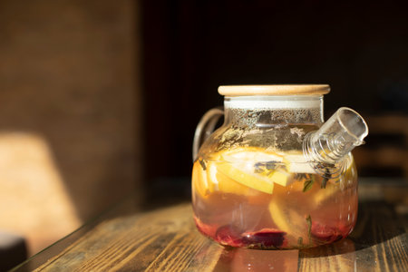Teapot with fruit. Transparent tableware. Healthy drink. Fortified tea.の写真素材