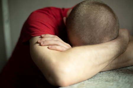 Guy is sleeping. Man was tired. Human hands. Severe fatigue.の写真素材