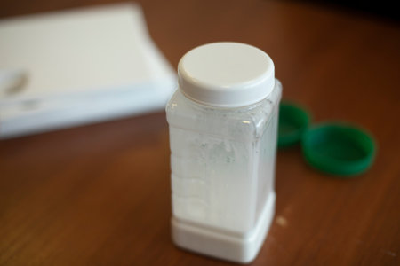Jar with glue. glue on table. Materials for creativity. white glue.の写真素材