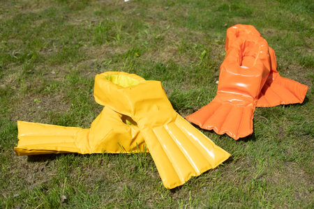 Sports equipment for games. fun boots. Duck flippers on green grass. fun game. inventory details.の写真素材