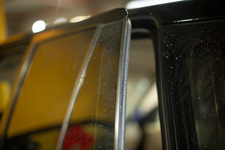 Car door. Car at the car wash. Transport in detail. Wet Door.の写真素材