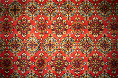 Red carpet. Fabric texture. Old red carpet. Fabric product. Native patterns.の写真素材