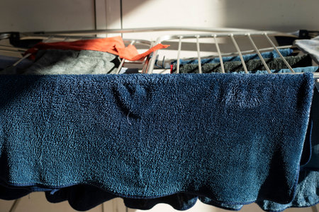 Washed clothes. Wet towel. Clothes dryer. Wet clothの写真素材