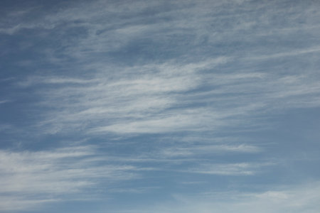 Clouds in the sky. Light clouds. Blue sky in September. Weather details. A clear day.の写真素材