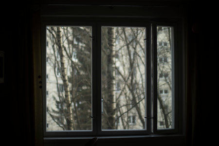 The view from the window. Window in the apartment. Interior details. Window frame in the building.の写真素材