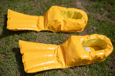 Equipment for games. Big Fins. Duck legs made of rubber. Inflatable Equipment for Sports Games.の写真素材