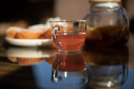 Tea with donuts. Food on table. Woosa breakfast. Fruit teaの写真素材