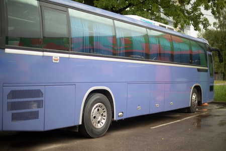 Blue bus in parking lot. Regular bus in fleet. Public transport. Big car.の写真素材