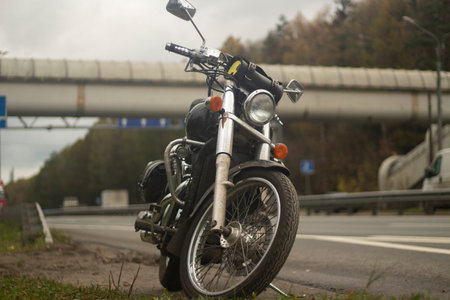 Motorcycle black color. Bike on the side of the road. Personal transport. Chrome plated parts.の写真素材