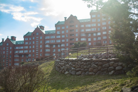 Park in the city. Landscaping in the park. Artificial Alpine Slide. A wall of cobblestones in the park.の写真素材
