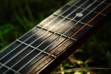 Close-up of guitar strings in the sunlight.の写真素材