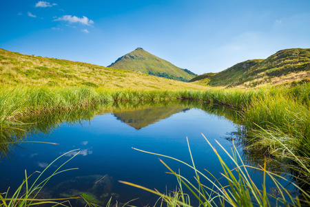 Lake and peak summer landscapeの写真素材