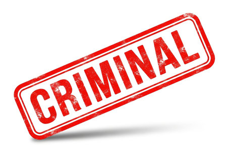 A distinct red and white rubber stamp boldly displays the word CRIMINAL in a distressed, impactful font, conveying a sense of official notice or legal action. Perfect for legal or justice-themed content.の素材