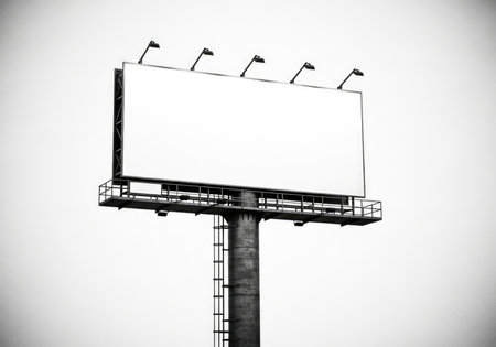 Isolated blank billboard with a clean white screen, providing ample copy space for custom advertisements or promotional messages. Ideal for marketing mockups and commercial campaigns.の素材