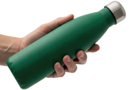 A close-up shot of a person's hand firmly gripping a modern, vibrant green insulated water bottle, ideal for promoting hydration, sustainability, and an active lifestyle.の素材