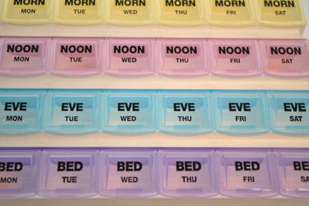 Close-Up of a Colorful Pill Boxの写真素材