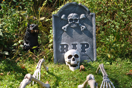 Hallowween-Skeleton Bones in Front of a Gravestone の写真素材
