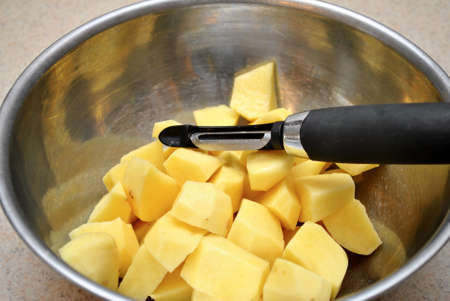Potato Peeler with Potatoesの写真素材