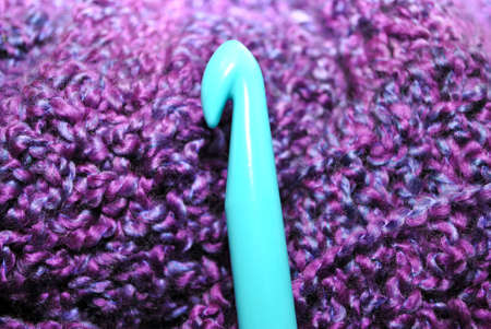 Purple Crochet with Blue Plastic Hookの写真素材