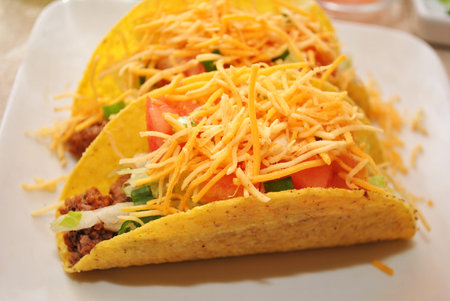 Cheesy Beef Tacos on a Plateの写真素材
