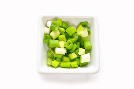 Flavorful Green Onion Sliced in a White Bowlの写真素材
