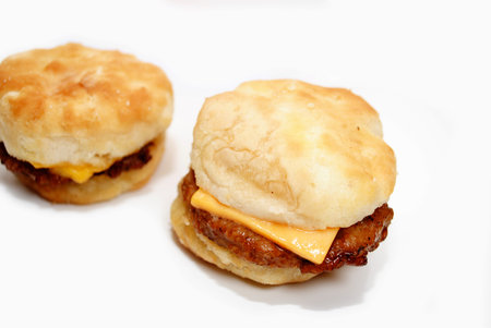 A Delicious Cheesy Sausage Biscuit Sandwichの写真素材