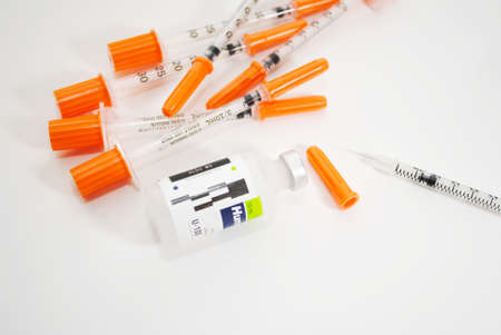 Disposible Needles with a Vial of Insulineの写真素材