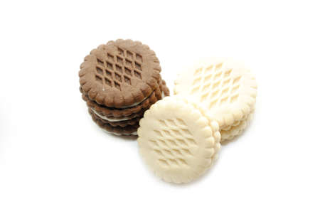 Vanilla and Chocolate Dessert Cookies on a White Backgroundの写真素材