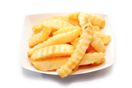 French Fries in a Take Out Container Over White
