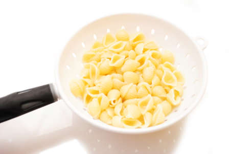 Shell Pasta in a Strainerの写真素材
