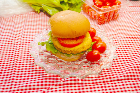 Chicken Pattie Sandwich with Lettuce and Tomatoの写真素材