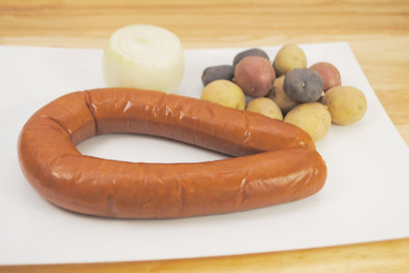 Uncooked Kielbasa and Whole Tri-Colored Potatoesの写真素材